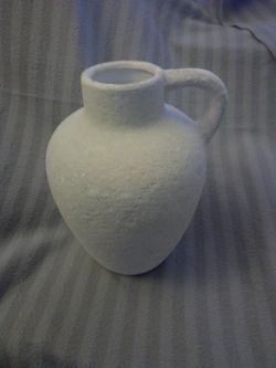 Textured White Ceramic Pitcher Vase-9" tall x 6" wide.  
Hole is 3" wide.