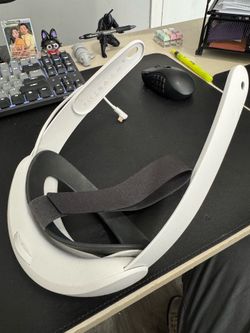 Meta quest elite strap and compact charging dock.