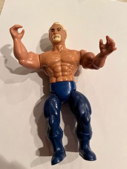 This is a vintage 1985 Remco AWA action figure of Paul Ellering, famously known as "Precious”.