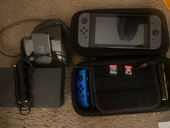 Nintendo switch with two games