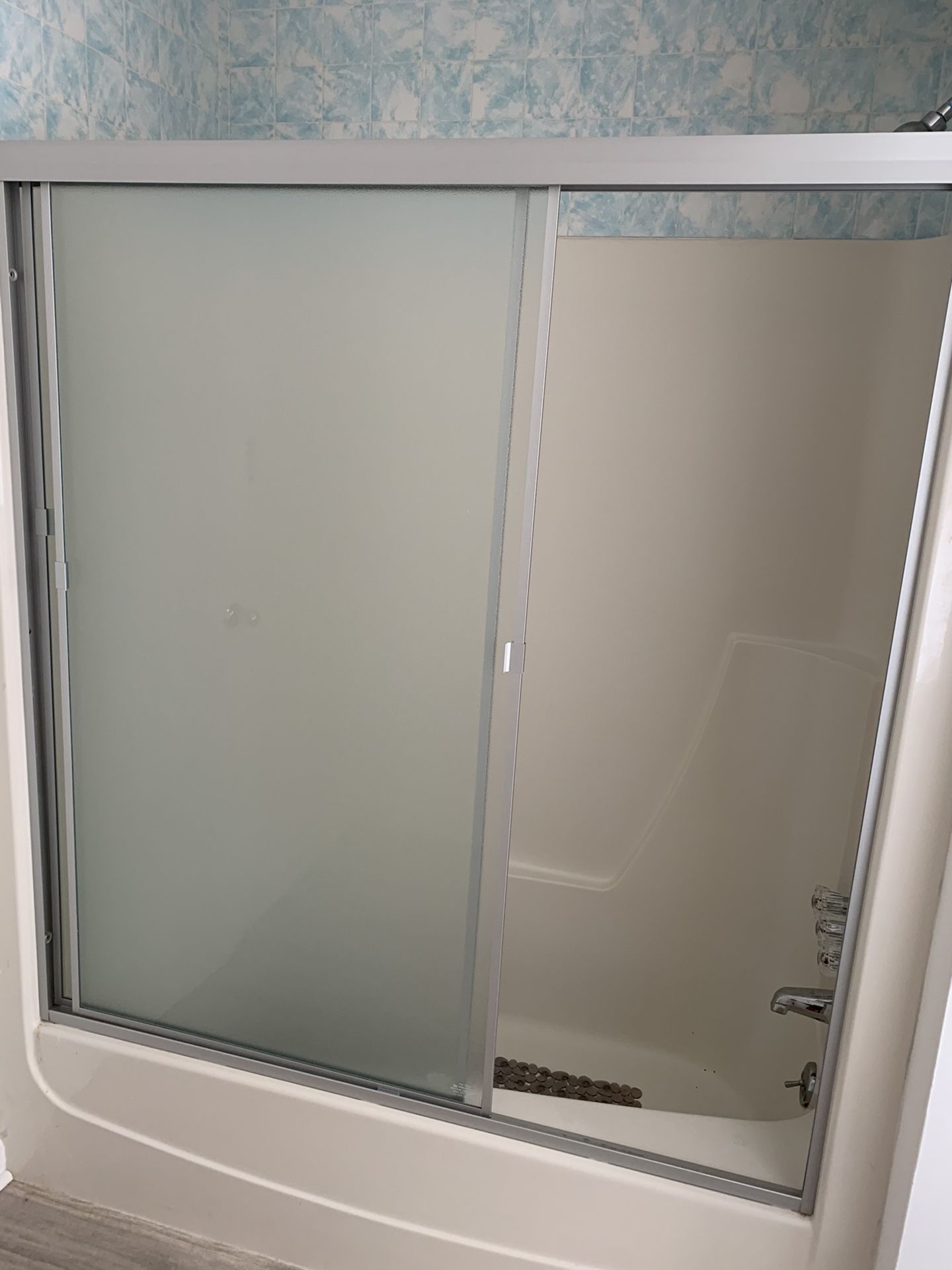 Frosted glass sliding shower doors