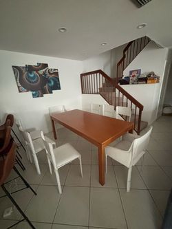 Wood Dining Table with 8 White Chairs
