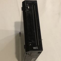 Nintendo Wii home video game console, specifically the RVL-001 model which features backward compatibility with GameCube games.  Model: RVL-001 (Black