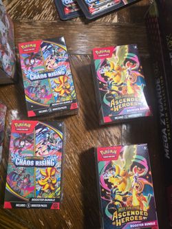 Chaos Rising packs 8.00 each Ascended heroes packs  12.00 each