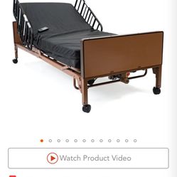 Twin powered hospital bed