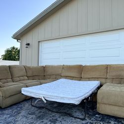 Living spaces beige sectional with recliner & pullout bed DELIVERY AVAILABLE