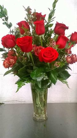 Mother's Day Dozen rose arrangement with filler flowers