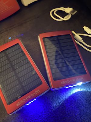 Photo Solar power bank 30000 mah life new with charger can deliver new 1 for 25 or 2 for 40