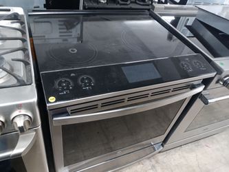 GE stainless steel induction glasstop slide-in range - Free delivery