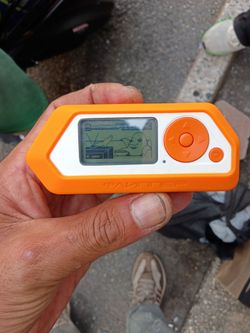 Flipper Zero with Orange Silicone Case