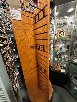 🛍️ FOR SALE – ROTATING WOOD DISPLAY RACK 🛍️  Price: $65  Need a professional way to display your merchandise? This rotating wood slatwall display ra