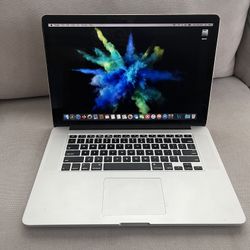2015 MacBook Pro 15 inch quad core I7/16GB/256GB