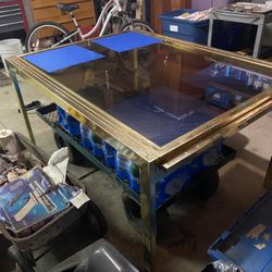 Glass dining room table with slidable leafs