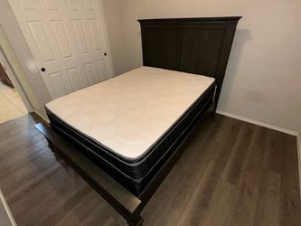 Used-Queen sized Bed frame with media outlets $100.00