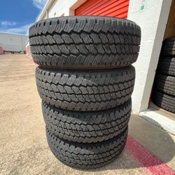 LT275/65/R20 Bridgestone dueler all-terrain 10 ply load range E Chevy Gmc Ford Rims