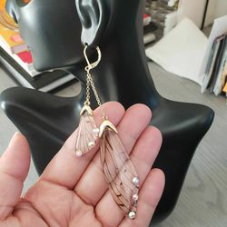 Beautiful earrings with fairy wings design