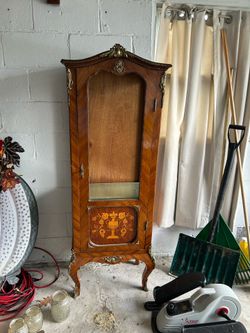 French reproduction curio cabinet
