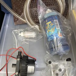 Water cooling equipment. Pump, CPU block, tubing, clamps, nozzles 