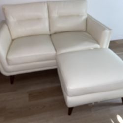 Leather Couch And Fireplace Shelf 