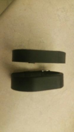 2 Fitbit flex bands, 1 is adjustable the other is size large