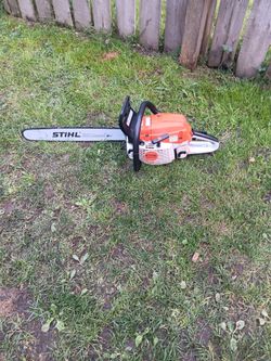 stihl chain saw with 20" bar model MS-261C used 2 times runs great