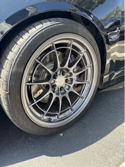 Enkei NT03 18x9.5 5x100 w/ Tires