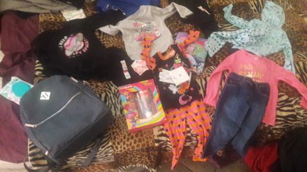 Girls 4t clothes n backpack diaper bag all btlrand new and a tooth brush n toothpaste set