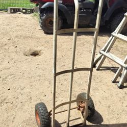 $40 For A Dolly It's Really Good Shape You Just Need The Air Of The Tires Up Popped Off The Rim And It Is