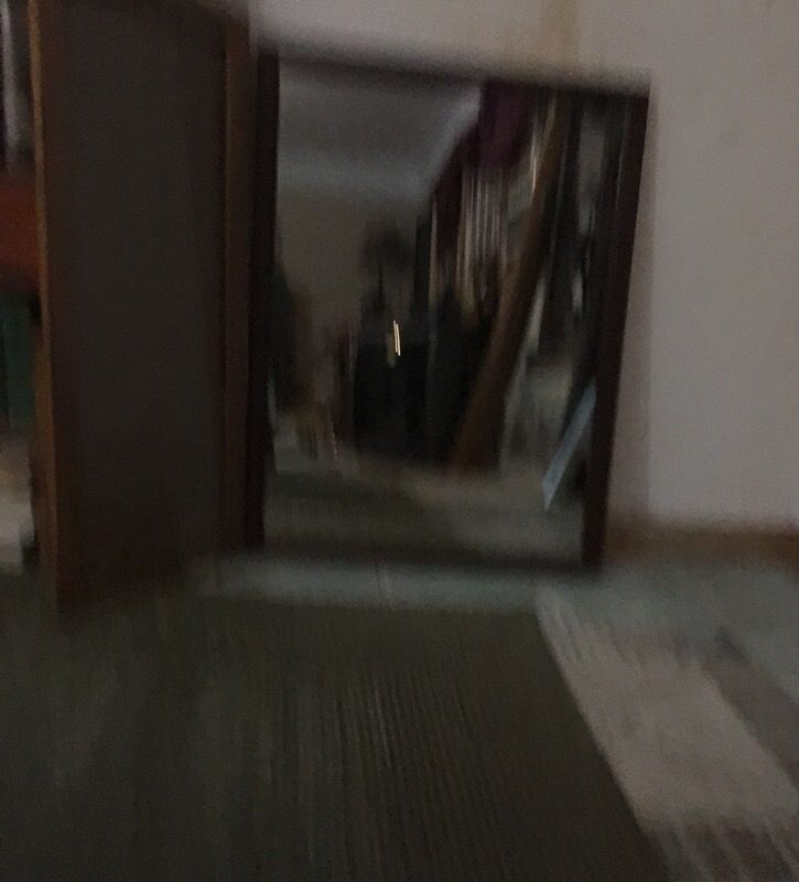 Large mirror with heavy wooden frame and a second frame
