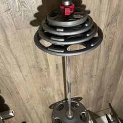 Olympic Barbell 6 ft & Weight Plates Hampton 45s, 35s, 25s[ & 10 lbs. Weider].  Total: 258 Pounds.