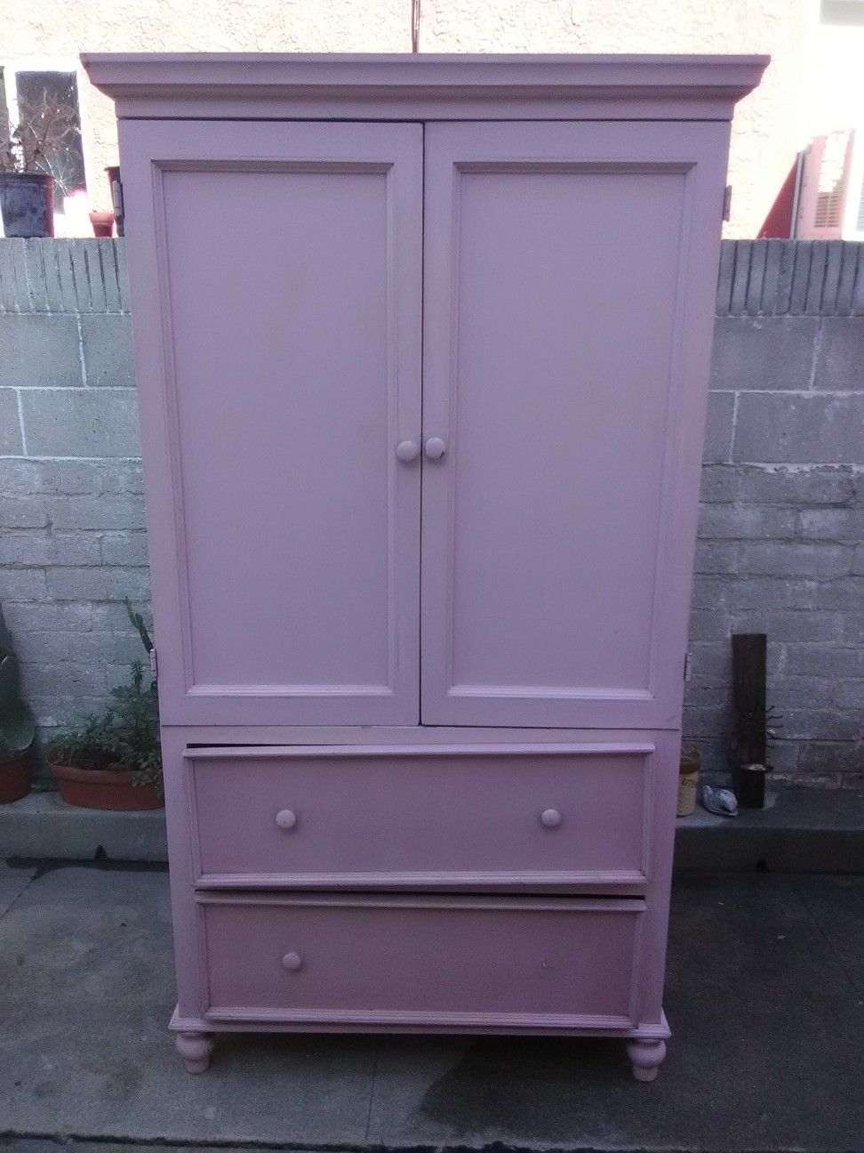 Large, solid wood armwar,. 78" height. 24" width. 40" length. Huntington. Park