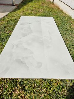 24x48 Polished Porcelain Light Onyx Gray
