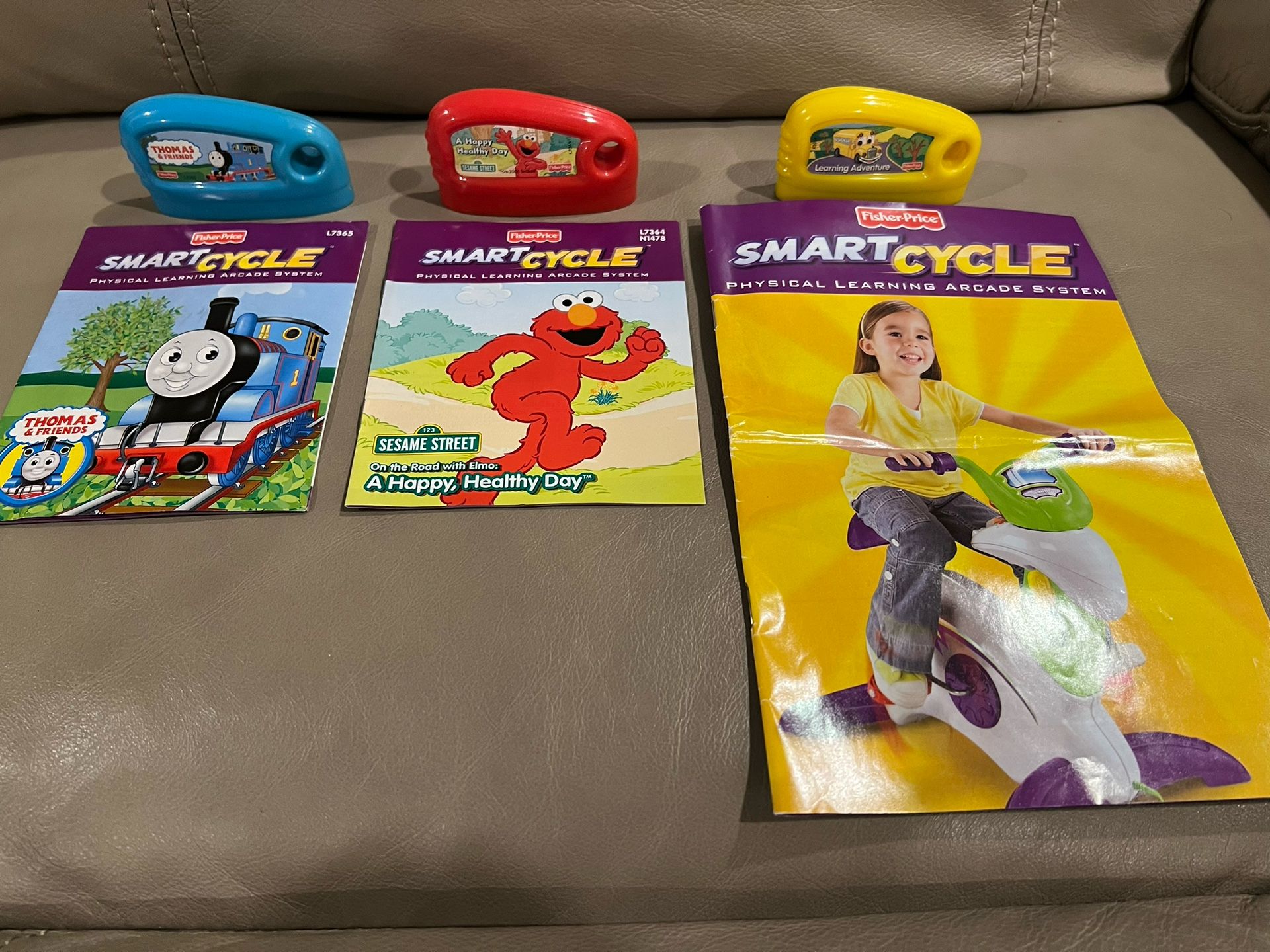 Fisher Price Smart Cycle • Lot of 3 Game Cartridges - Elmo, Thomas & Friends, and Learning Adventure