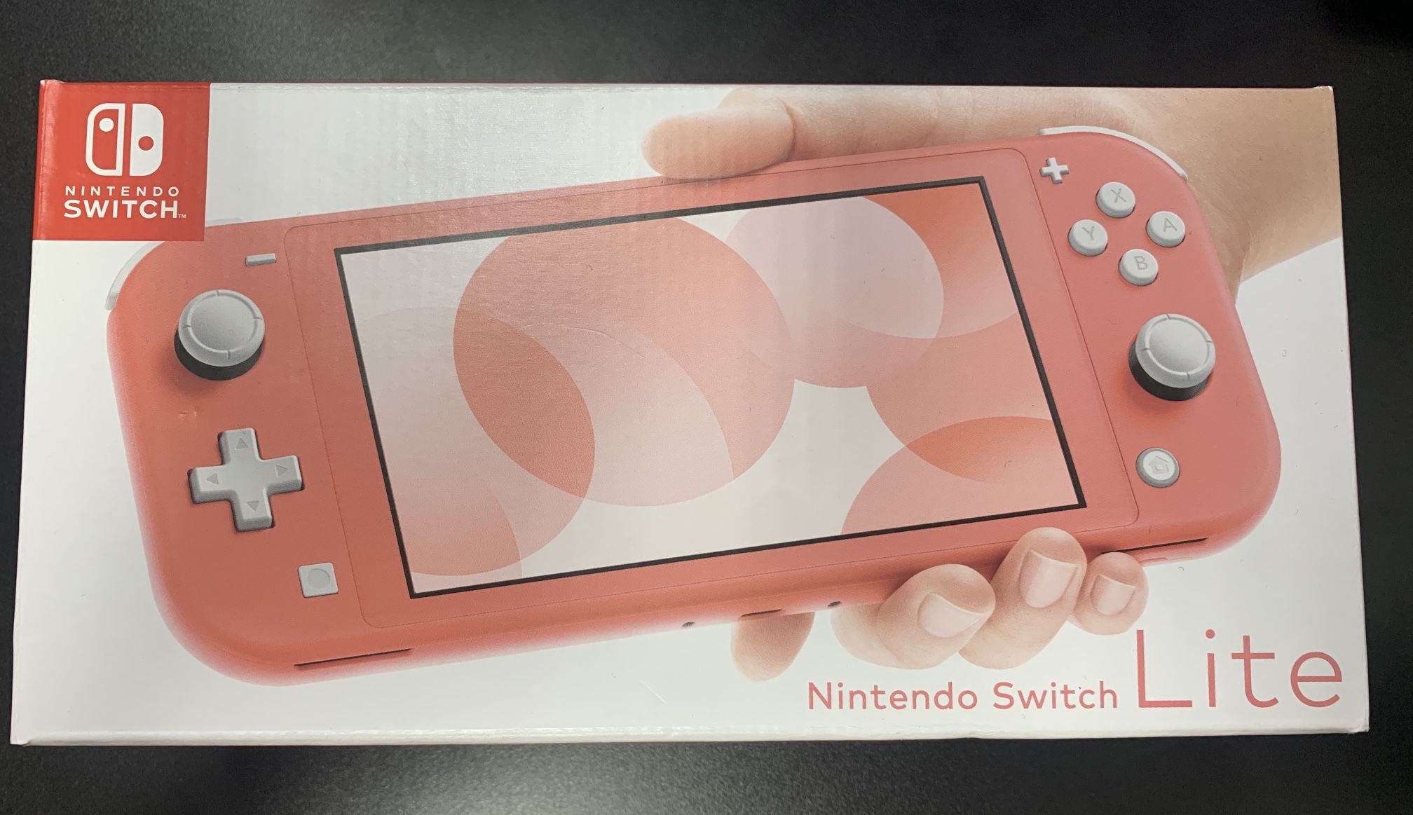 Nintendo- switch 32GB Lite- Coral
