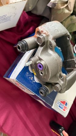 Coated brake caliper