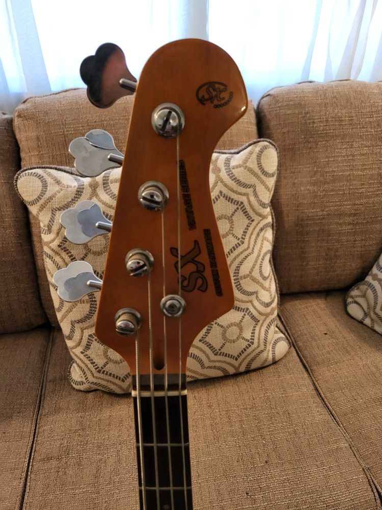 Sx Vintage Series P-Bass Guitar with stand