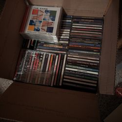 100 CD's ( Random Assortment )