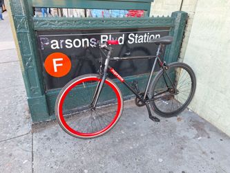 Matte Black Fixed Gear Bike with Red Rims