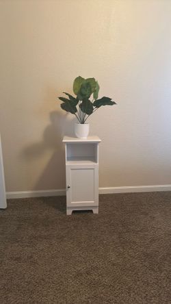 Small white storage cabinet