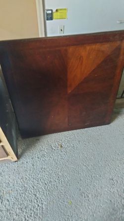 Solid cherry wood table with all four legs and hardware.