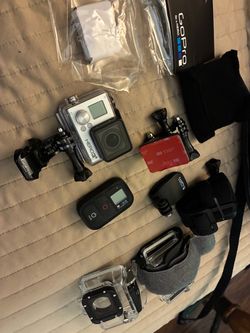 Go pro with accessories/ bag