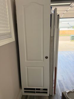 White Interior Door with Louvered Vent Panel