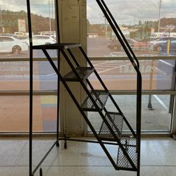 Metal rolling ladder