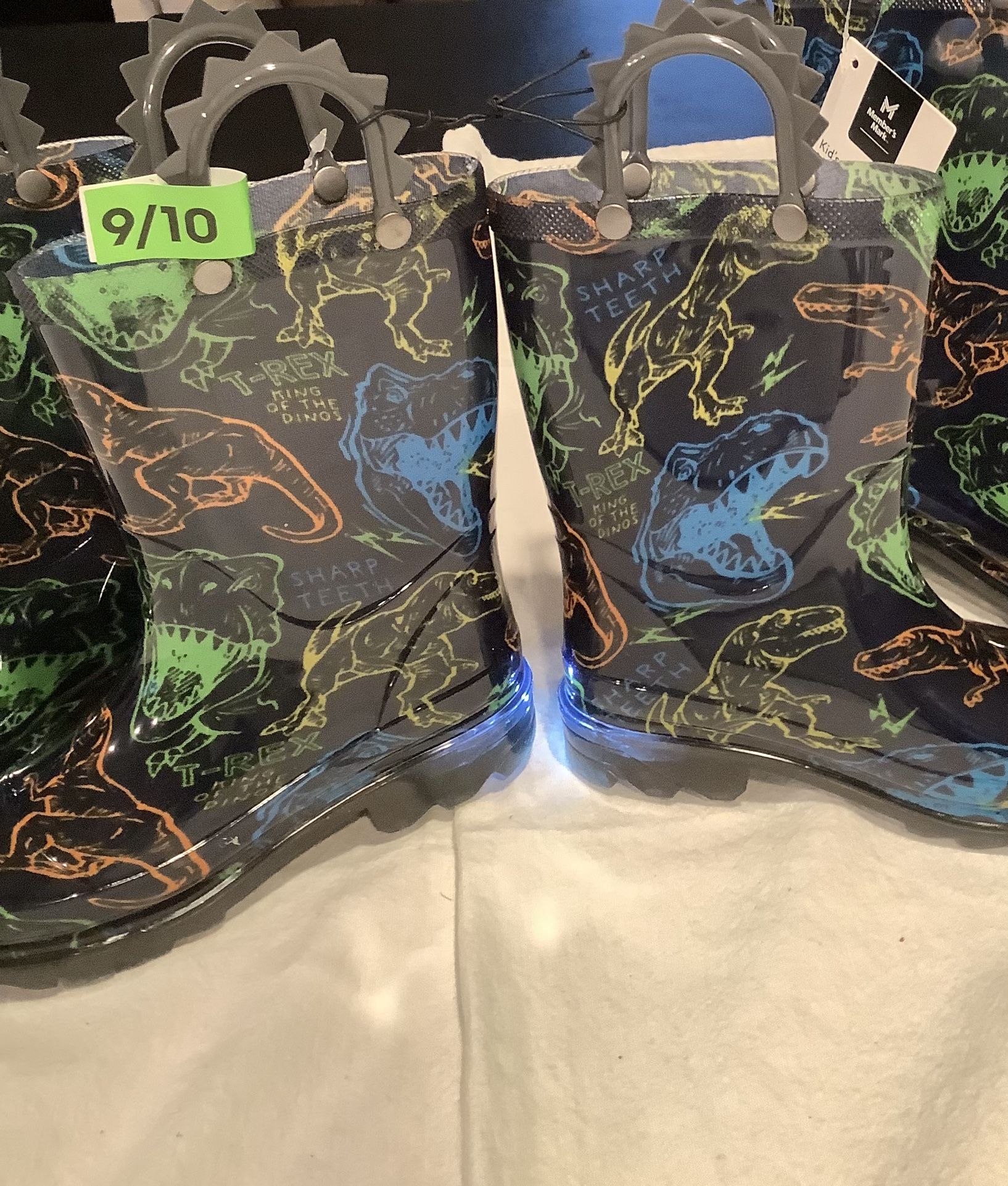 RAIN BOOTS THAT LIGHT UP FOR BOYS SIZE 7/8 , 9/10, New With Tags $28.00 For Each Pair.