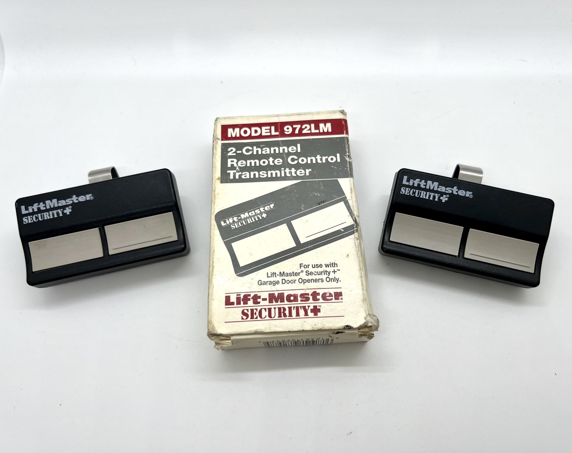 Set of Lift-Master 972LM 2 Channel Remote Control Transmitters