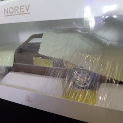 1:18 Scale Die-cast Model of a Mercedes-Benz w124 Series Car, Manufactured by NOREV