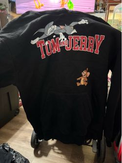 Smurfs sweater size medium & tom and Jerry is a medium