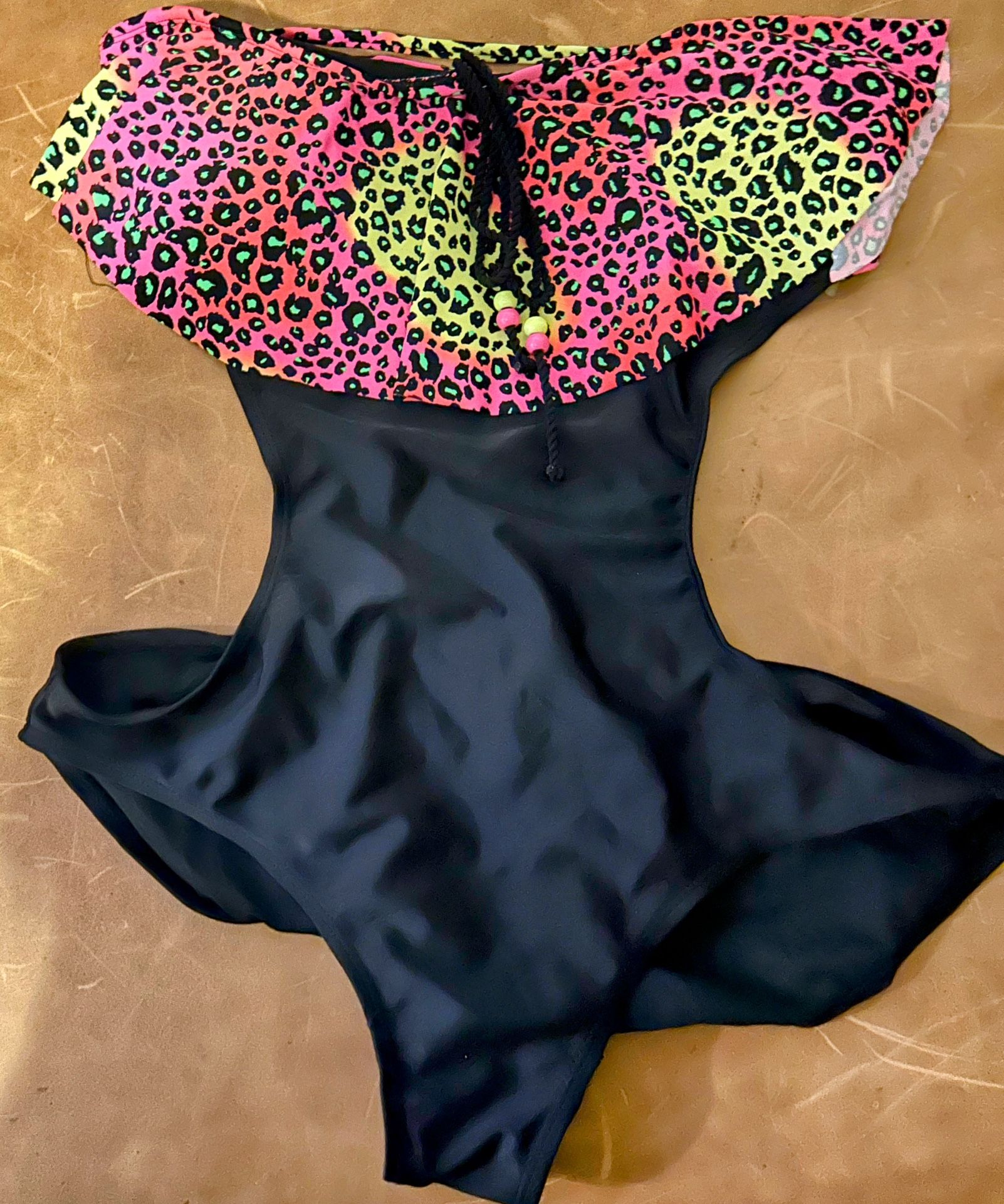 Open back one piece rainbow and black cheetah print swimsuit size large
