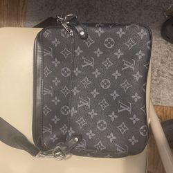 LV Man purse