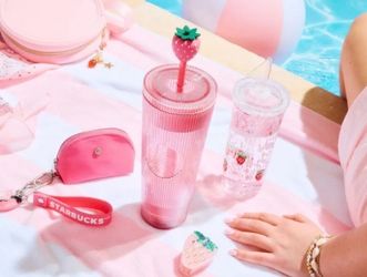 Pink Starbucks cup w strawberry straw topper